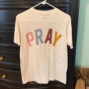 Cream T-Shirt with Colorful 'PRAY' Graphic